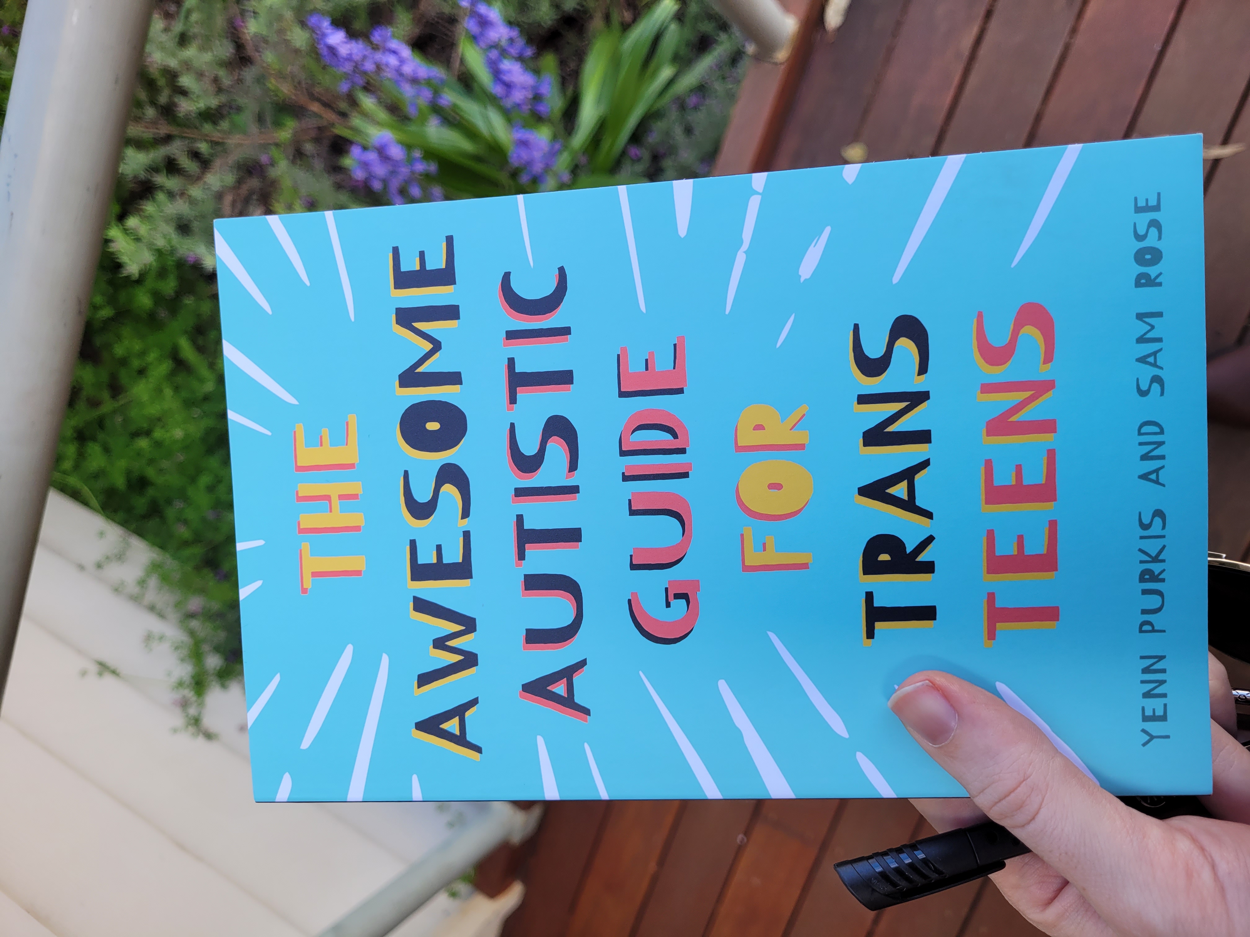 A photo of the book The Awesome Autistic Guide For Trans Teens by Yenn Purkis and Sam Rose.